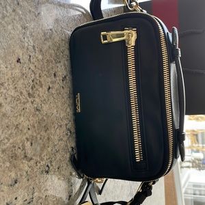 Tumi black leather crossbody